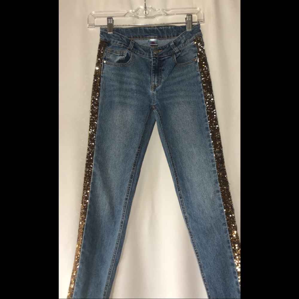 Blue denim jeans with reversible sequins